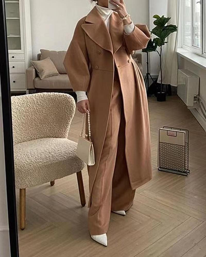 Cappotto lungo con maniche a lanterna e colletto per donna