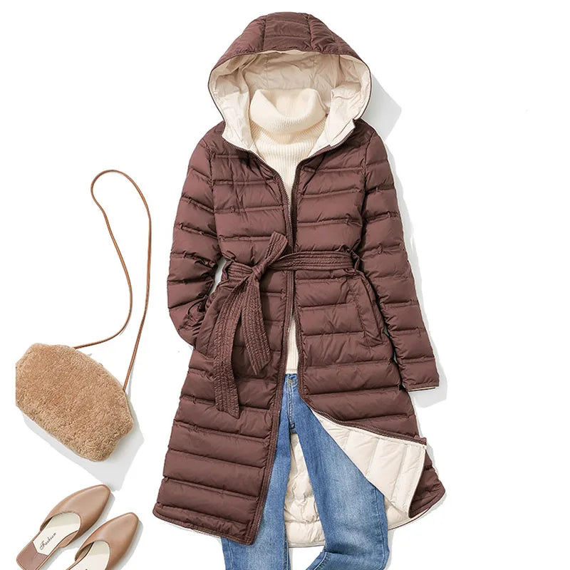 Piumino lungo da donna con cappuccio